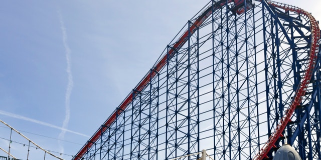 Blackpool, UK - June 11, 2014: View of Blackpool funfair. A wide angle view of the "the big one" a large roller coaster ride. There are no people in the photograph.