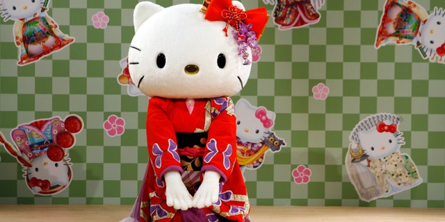 File photo - A performer dressed as a Hello Kitty masot wearing a kimono performs a classical Japanese dance at a event named "Let's learn Japanese culture with Hello Kitty" at Tamagawa Takashimaya shopping center in Tokyo Sept. 2, 2007. (REUTERS/Toru Hanai)