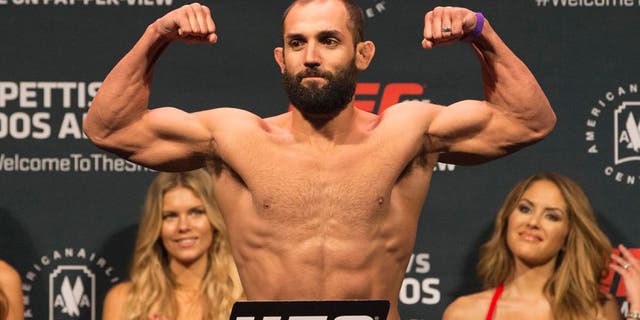 Mar 13, 2015; Dallas, TX, USA; Johny Hendricks stands on the scale during weigh-ins for UFC 185 at Kay Bailey Hutchison Convention Center. Mandatory Credit: Tim Heitman-USA TODAY Sports