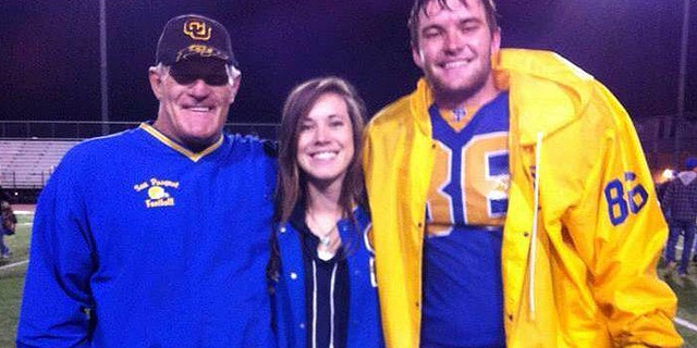 Steve Hendrickson, a former NFL linebacker who suffered at least 12 concussions during his 7-year career, stands with his daughter Courtney and son Kyle in an undated photograph. (Courtesy: Kyle Hendrickson)