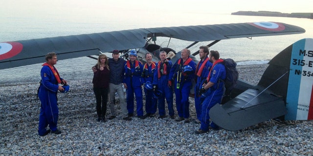 Coast Guardsmen helped Rockey and Spiller tow the aircraft to a safer location down the beach.