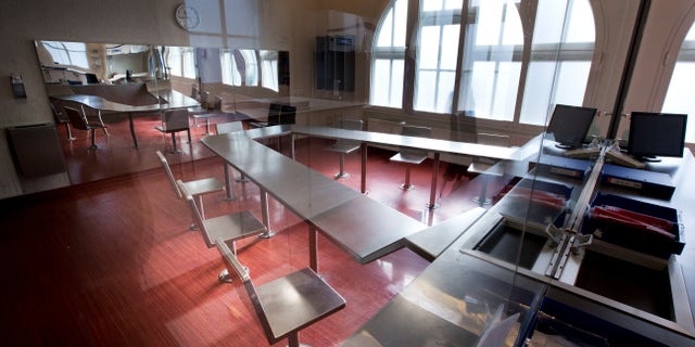 Surveillance cameras, right, are mounted underneath a metal table with chairs bolted to the floor where addicts can inhale heroin fumes in a clinic in Amsterdam, Netherlands, Tuesday, April 12, 2016. An alarming 47,000 American overdose deaths in 2014 _ 60 percent from heroin and related opioid painkillers like fentanyl _ has pushed elected leaders in New York, California and other states to consider what was once unthinkable: government-sanctioned sites where users are under the supervision of a doctor or nurse who can administer an antidote if necessary
