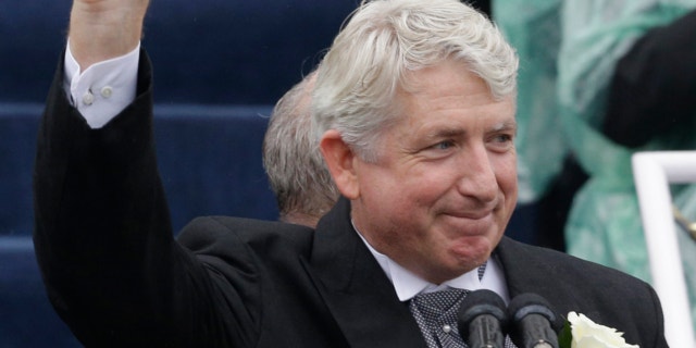Jan. 11, 2014: Virginia Attorney General Mark Herring waves after taking the oath of office during inaugural ceremonies at the Capitol in Richmond, Va..