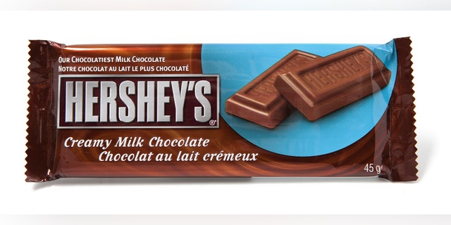 Toronto, Canada - May 8, 2012: This is a studio shot of Hershey's Creamy Milk Chocolate made by Hershey's isolated on a white background.