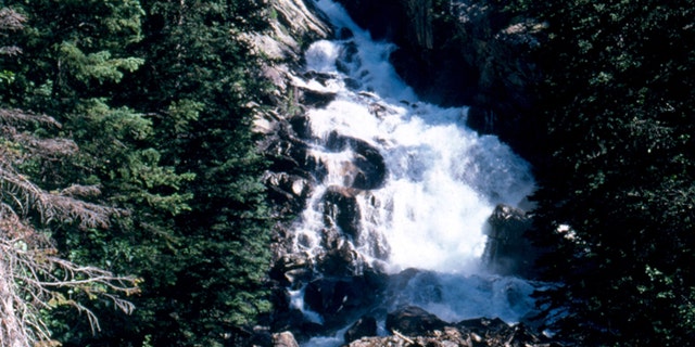 Hidden Falls, at Grand Teton National Park, is seen above. A portion of the park was closed due to large cracks and fissures that appeared.