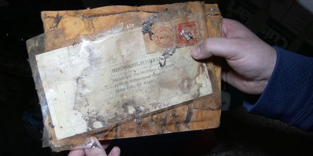 Under the rubble, they found shelving units that held children’s toys, a woman’s handbag, hair curlers and a letter.