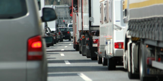 Traffic jam caused by a fatal accident on the highway during rush hour.