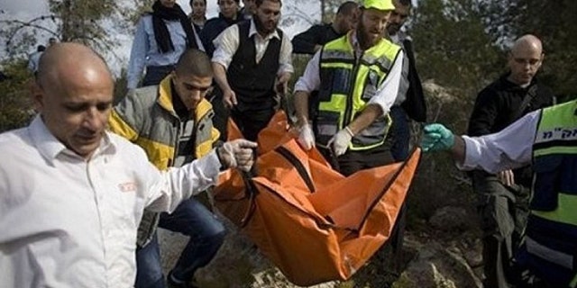 File photo shows Luken's body being carried from the scene.