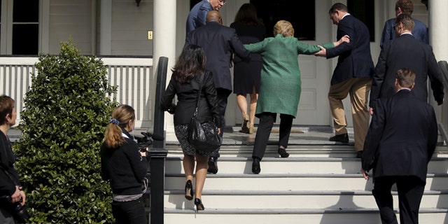 Hillary Clinton lost her balance briefly as she arrived for a tour of a home for ex-offenders and substance abusers in North Charleston, S.C., on Feb. 24, 2016.