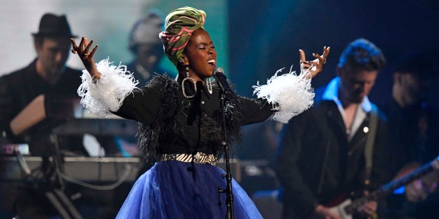 Recording artist Lauryn Hill pays tribute to Nina Simone during the Rock and Roll Hall of Fame induction ceremony, Saturday, April 14, 2018, in Cleveland.