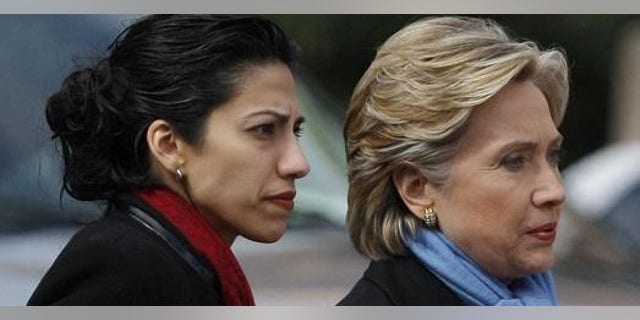 Hillary Clinton and Huma Abedin (Reuters photo)