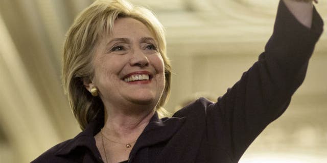 U.S. Democratic presidential candidate Hillary Clinton waves after testifying to the House Select Committee on Benghazi on Capitol Hill in Washington October 22, 2015. REUTERS/Joshua Roberts