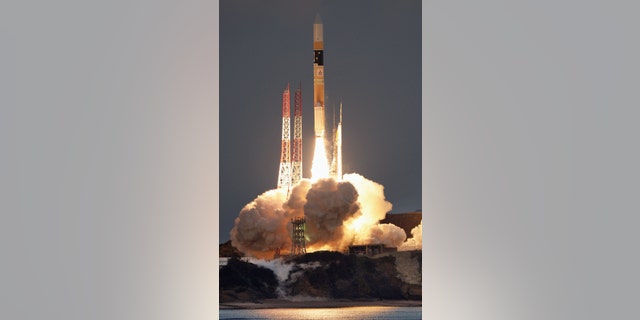 In this Feb. 17, 2016 photo, an H-2A rocket carrying an X-ray astronomy satellite called "Hitomi", is launched from the Tanegashima Space Center in Kagoshima Prefecture, southern Japan. (Kyodo News via AP)