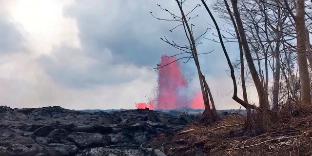 This May 29, 2018 photo from video provided by the U.S. Geological Survey shows lava from a fissure created fountains to heights of 200 feet at times, near Pahoa, Hawaii.