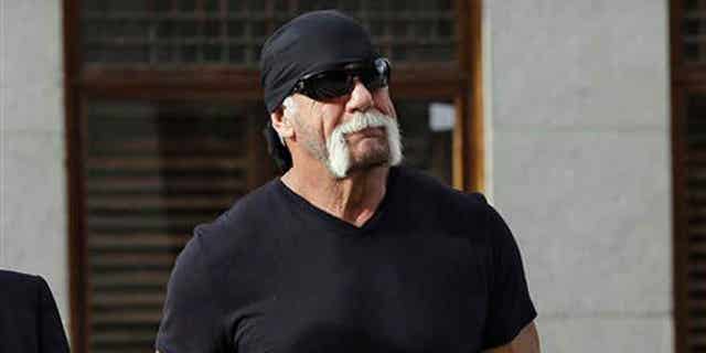 In this Oct. 15, 2012 file photo, former professional wrestler Hulk Hogan, whose real name is Terry Bollea, arrives for a news conference at the United States Courthouse in Tampa, Fla.