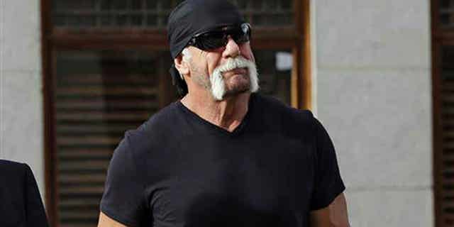 In this Oct. 15, 2012 file photo, former professional wrestler Hulk Hogan, whose real name is Terry Bollea, arrives for a news conference at the United States Courthouse in Tampa, Fla.
