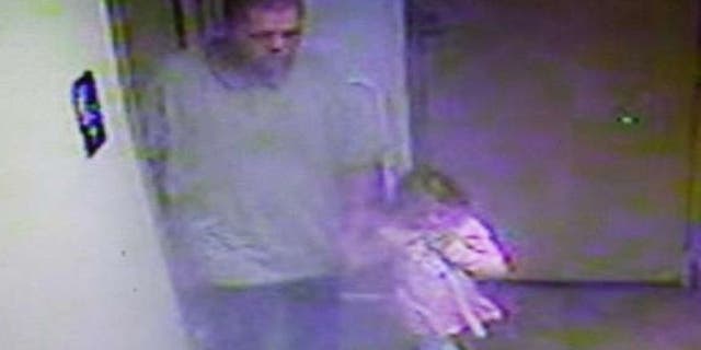 Surveillance footage taken from a Georgia gas station showing West Wild Hogs and Rebecca Lewis.