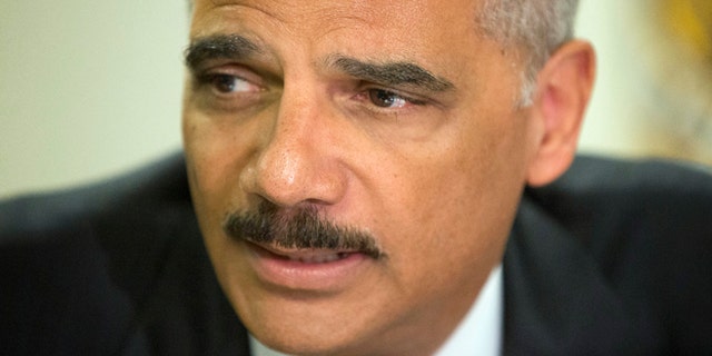 Aug. 20, 2014: Attorney General Eric Holder speaks during his meeting at the FBI building in St. Louis.