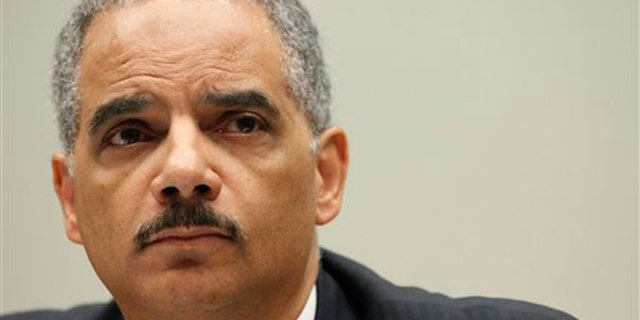 Attorney General Eric Holder testifies before the House Judiciary Committee May 13 on Capitol Hill. (AP Photo)