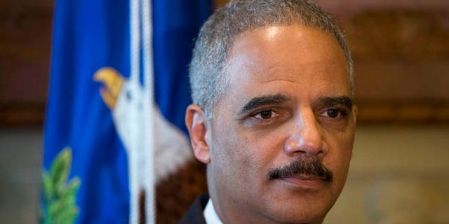 May 21, 2014: Attorney General Eric Holder pauses during a meeting at the Justice Department in Washington.