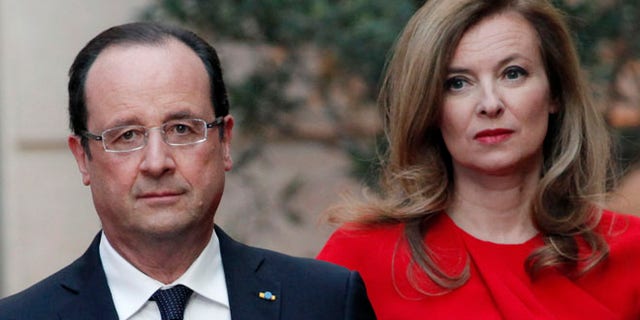 May. 7, 2013: In this file photo, French President Francois Hollande, left, and his companion Valerie Trierweiler arrive for a state dinner at the Elysee Palace, in Paris as part of Polish President Bronislaw Komorowski's two-day visit to France.