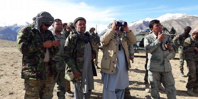 From the frontlines in Ishkashim. Commanding Officer Col. Mohammad Nader is the one second to the left in army jacket and gray Afghan dress.