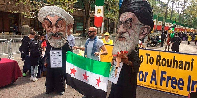Protestors outside the UN oppose the Iranian regime's role in the bitter Syrian war and support of dictatorial President Bashar al-Assad.