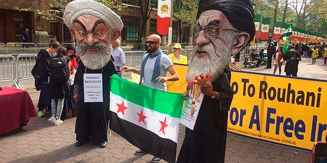 Protestors outside the UN oppose the Iranian regime's role in the bitter Syrian war and support of dictatorial President Bashar al-Assad.