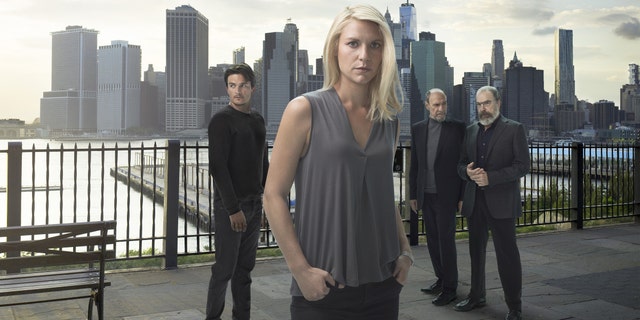 Rupert Friend as Peter Quinn, Claire Danes as Carrie Mathison, F. Murray Abraham as Dar Adal and Mandy Patinkin as Saul Berenson in Homeland (Season 6)