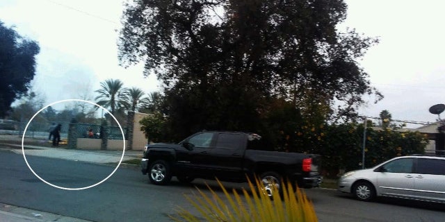 A picture taking by a witness showing Anthony Lawlor allegedly setting homeless couple’s tent on fire.