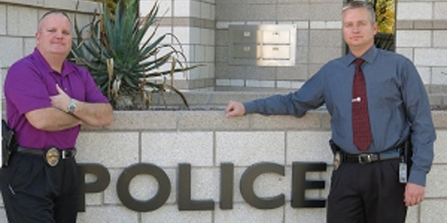 Peoria, Ariz., homicide detectives Chris Boughey, (l.), and Jeff Balson, (r.), have made it their mission to educate other law-enforcement officers about honor violence. (Courtesy: Chris Boughey)