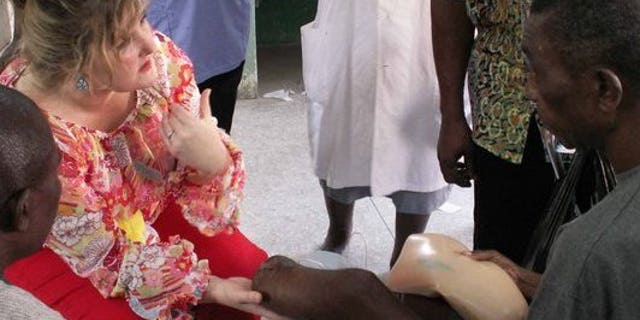 Gracie Rosenberger working with amputees in West Africa.