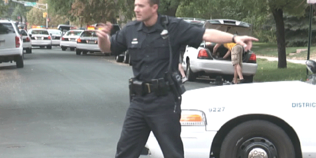 Police on the scene of reported hostage situation at a Radio Shack in Denver, Colo.
