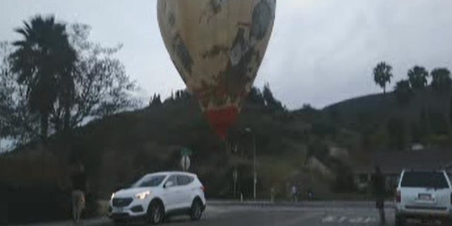 A hot air balloon made a crash landing in the Rancho Penasquitos area of San Diego on Sunday.