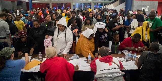 Thousands take shelter from the Tropical Storm Harvey at the George R. Brown Convention Center in Houston on Monday, Aug. 28, 2017.