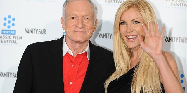 April 22, 2010:Hugh Hefner arrives with Playmate and actress Crystal Harris