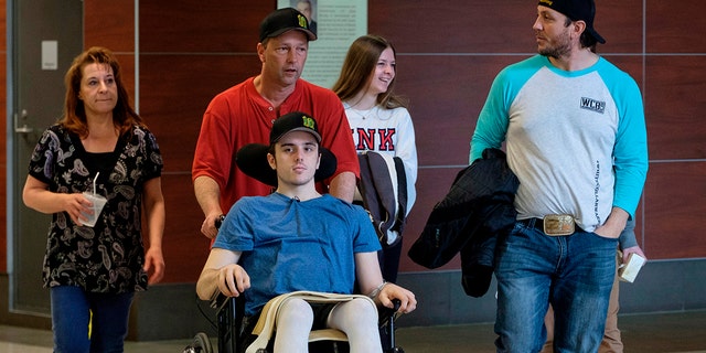 Ryan Straschnitzki was paralyzed following a bus crash that killed 16 people. He is scheduled to fly to Philadelphia on Wednesday to continue treatment.