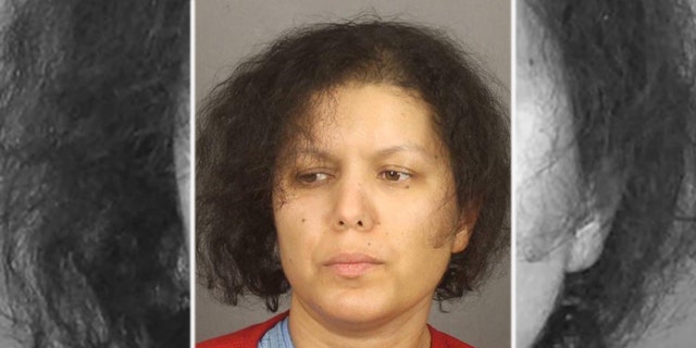 Mugshot for Hanane Mouhib, 36, who has been charged with decapitating her 7-year-old son Abrahma Cardenas in upstate New York.