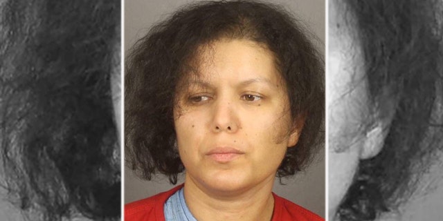 Mugshot for Hanane Mouhib, 36, who has been charged with decapitating her 7-year-old son Abrahma Cardenas in upstate New York.