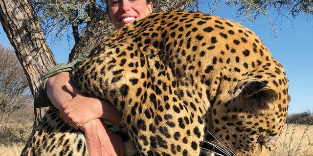 A female hunter is being slammed online by celebs for killing a leopard.