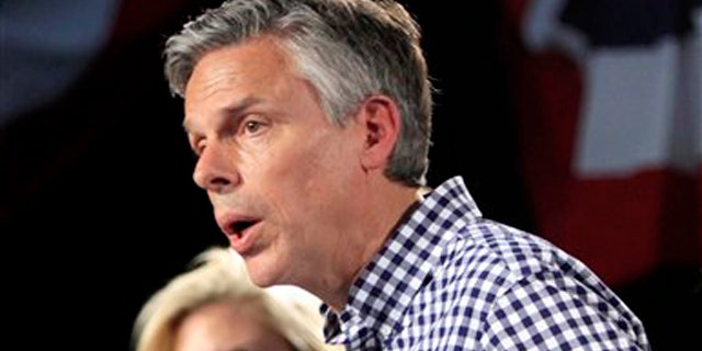 In this June 21, 2011, file photo, Mary Kaye Huntsman listens as her husband, Republican presidential candidate and former Utah Gov. Jon Huntsman, Jr., speaks at the Town Hall in Exeter, N.H.