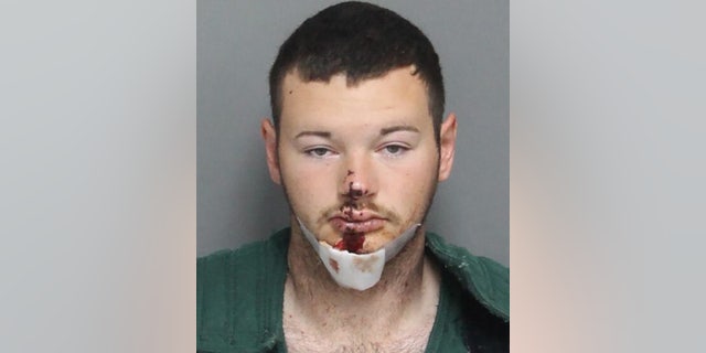 Colton Hurley, 20, shot himself in the face after holding a woman against her will and fatally shooting a horse, police said.