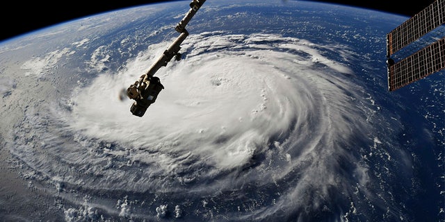 This photo provided by NASA shows Hurricane Florence from the International Space Station on Monday, Sept. 10, 2018, as it threatens the U.S. East Coast. Forecasters said Florence could become an extremely dangerous major hurricane sometime Monday and remain that way for days. (NASA via AP)