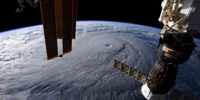 This image provided by NASA on Wednesday, Aug. 22, 2018 shows Hurricane Lane as seen from the International Space Station.