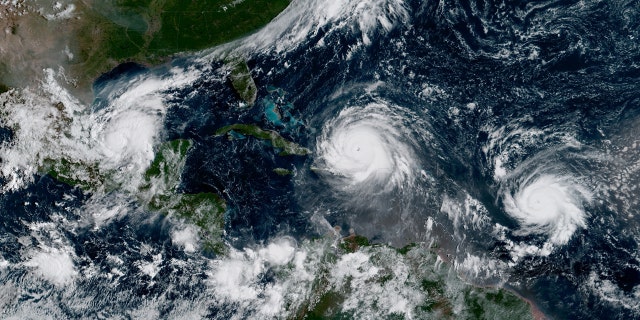 Hurricane Irma, Hurricane Jose (R) and Hurricane Katia (L) are pictured in the Atlantic Ocean in this September 7, 2017 NOAA satellite photo.