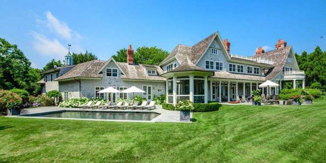 The 9,000 square foot home boasts seven bedrooms and seven full baths.