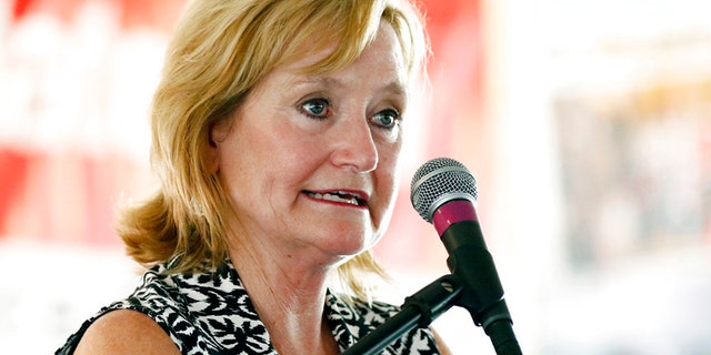 FILE - In this July 27, 2017, file photo Mississippi Commissioner of Agriculture and Commerce Cindy Hyde-Smith speaks at the Neshoba County Fair in Philadelphia, Miss. The state's governor will appoint Hyde-Smith as Mississippi's first female member of Congress to fill the Senate vacancy that will soon be created when Sen. Thad Cochran retires, three state Republicans told The Associated Press on Tuesday, March 20, 2018. (AP Photo/Rogelio V. Solis, File)