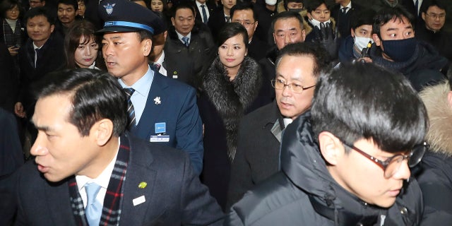 North Korean Hyon Song Wol, center, head of North Korea's art troupe, arrives at the Seoul Train Station in Seoul, South Korea, Sunday, Jan. 21, 2018.