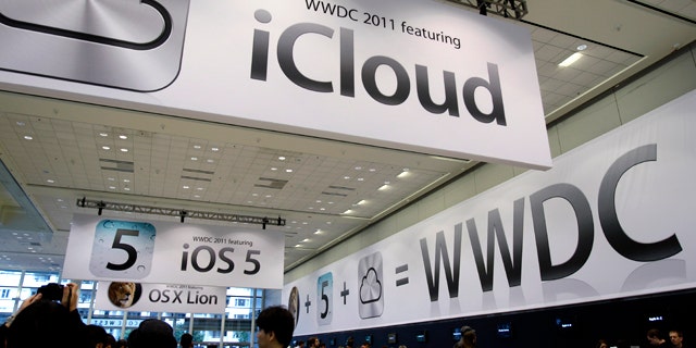June 6, 2011: Posters on display at the Apple Worldwide Developers Conference in San Francisco tout the new iCloud service. Apple CEO Steve Jobs is scheduled to take a break from medical leave Monday to announce iCloud.