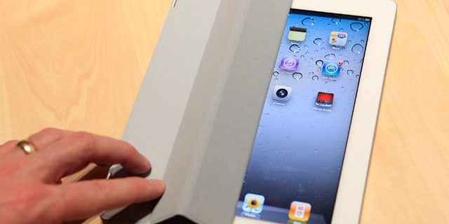 March 2: The iPad 2 with a Smart Cover is shown in use in the demonstration area after the iPad 2 launch during an Apple event in San Francisco, Calif.